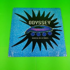 Disco Vinilo Odyssey riding on a train